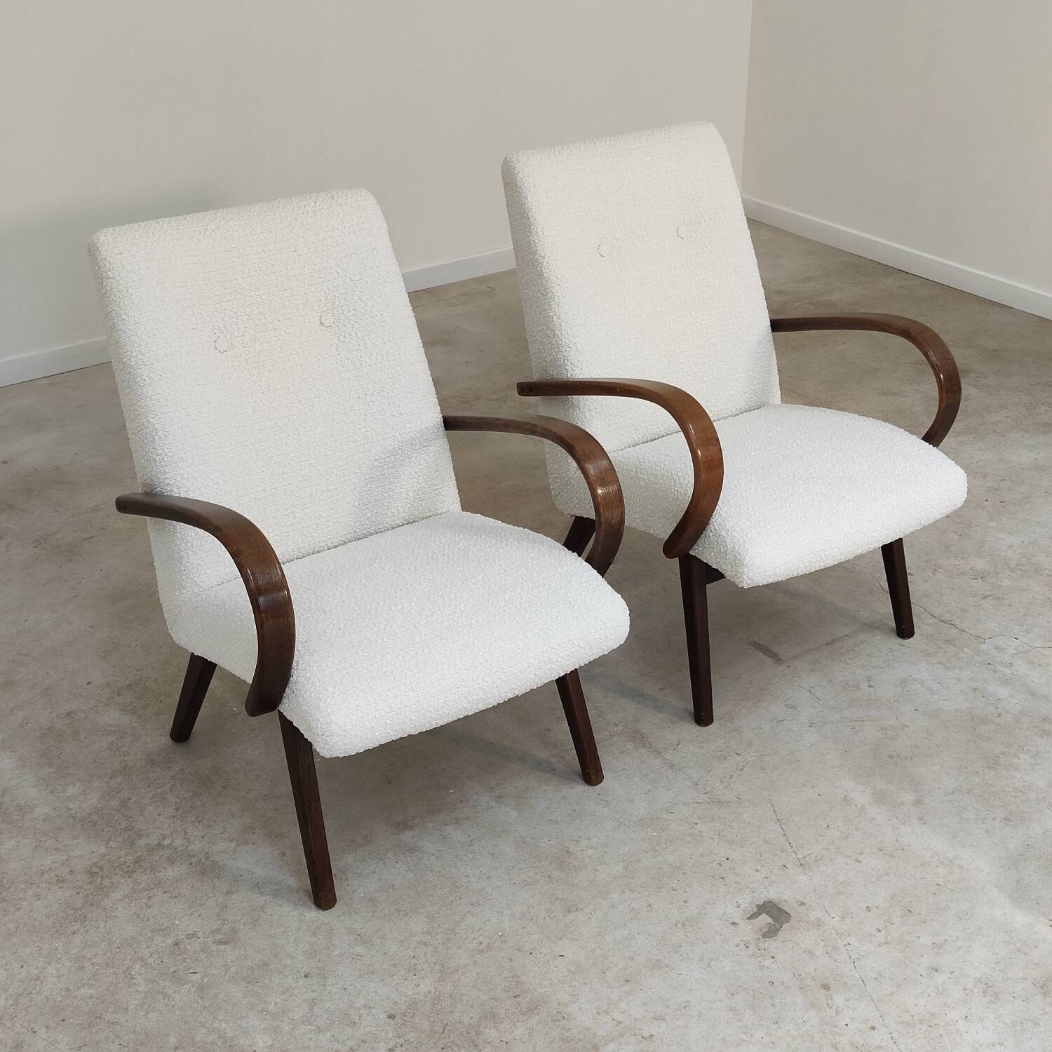 Pair of Jaroslav Smidek armchairs for Ton Bystrice, restored with white boucle, 1960.