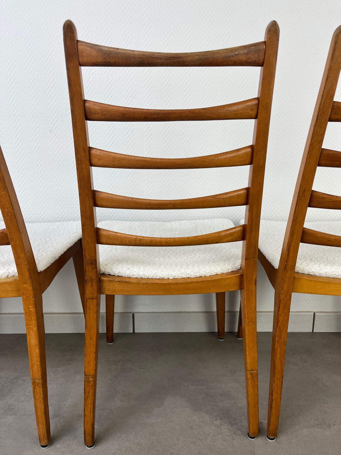 4 Scandinavian chairs, teak with boucle seats.