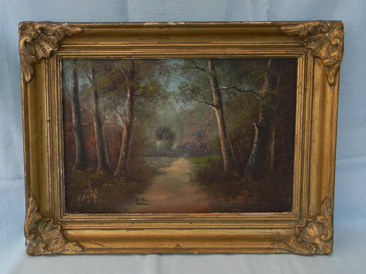 Old signed landscape painting under wood.
