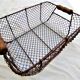Basket with 2 wooden handles in wire mesh