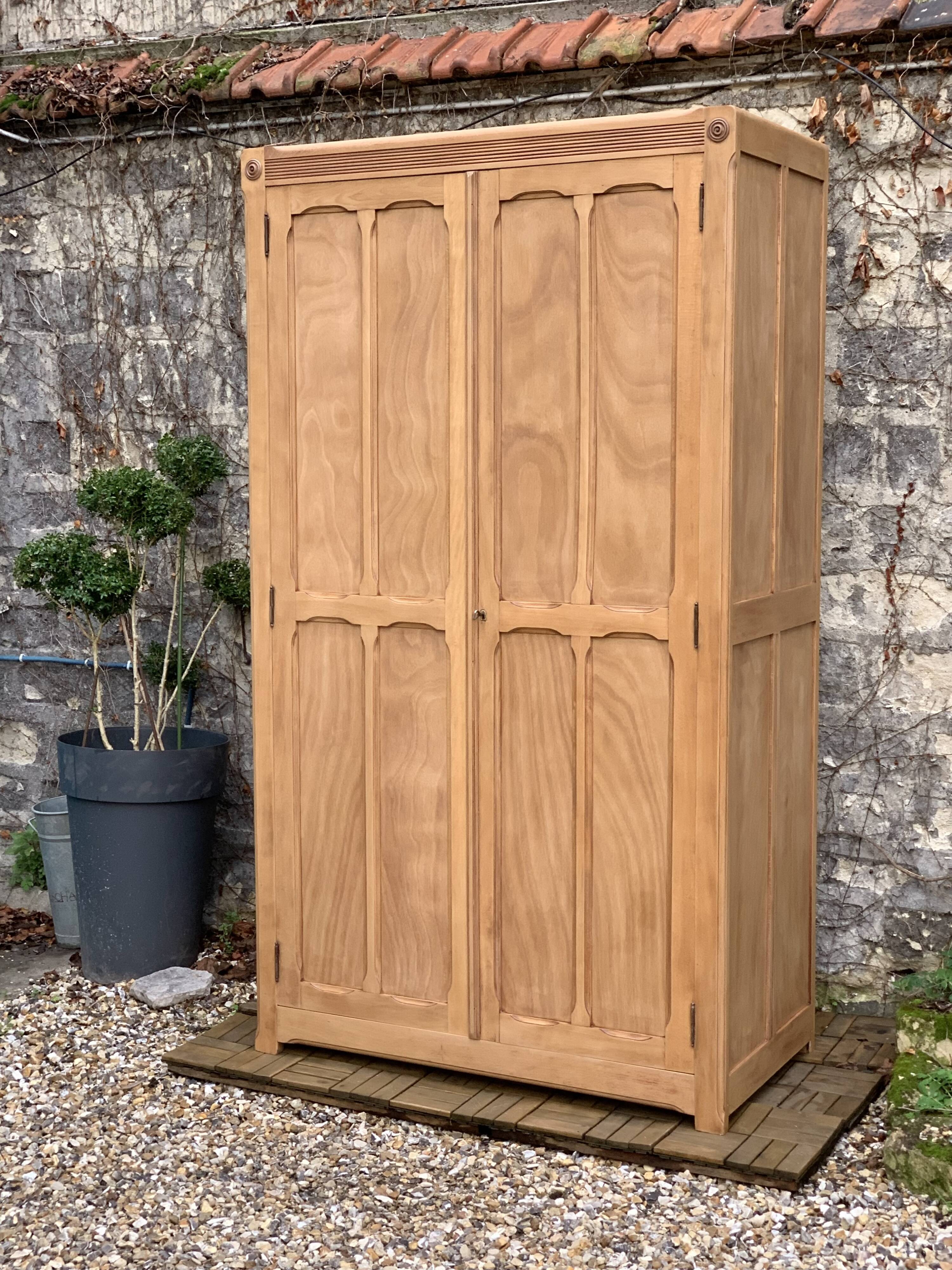 Parisian paneled cabinet in raw wood, 1940
