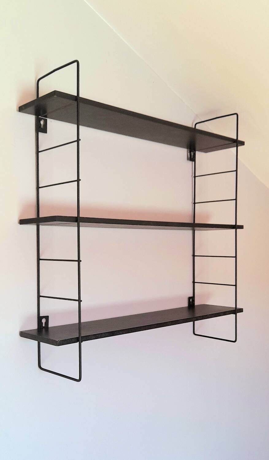String style wall shelf