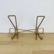 Wall coat rack with golden metal hook from the 1950s