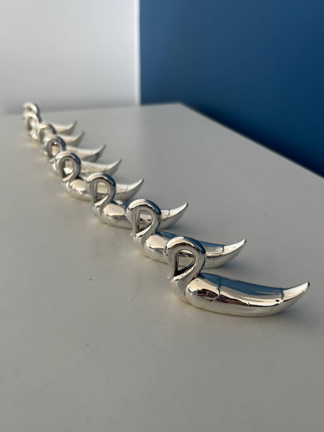 8 vintage silver-plated swan knife rests