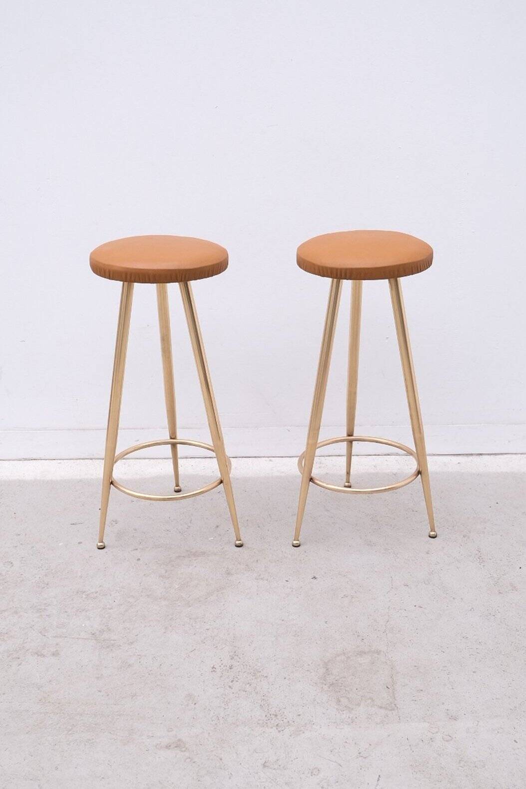 Pair of brass and leather stools, Italy 1960