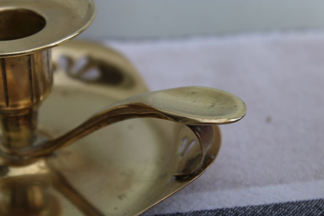 Golden brass candle holder