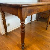 Walnut bistro table, feet turned.