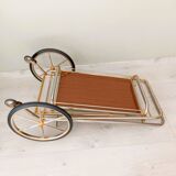 Rolling trolley in gold metal