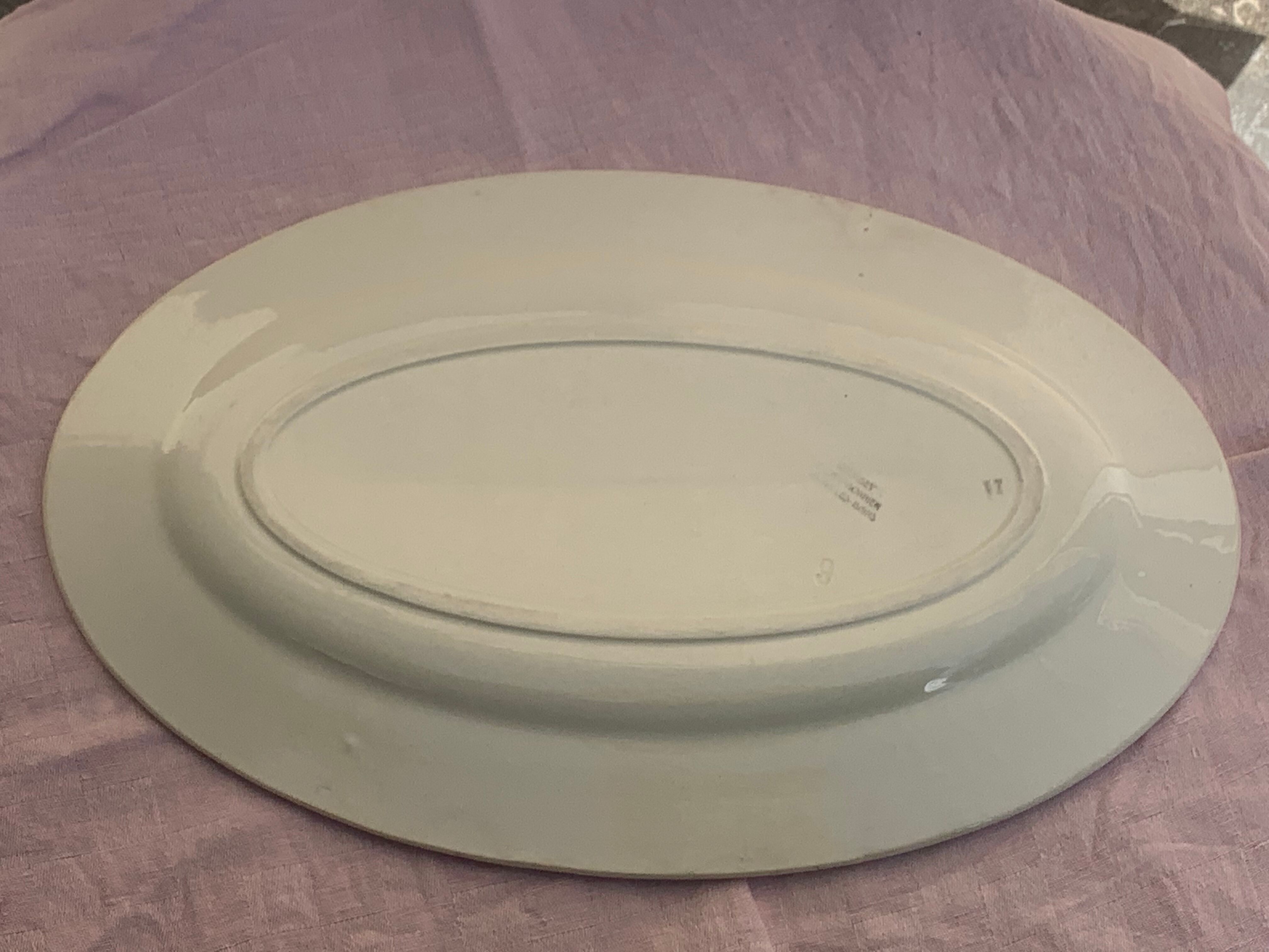 Serving dish in charcoal earthenware model Courbet art deco