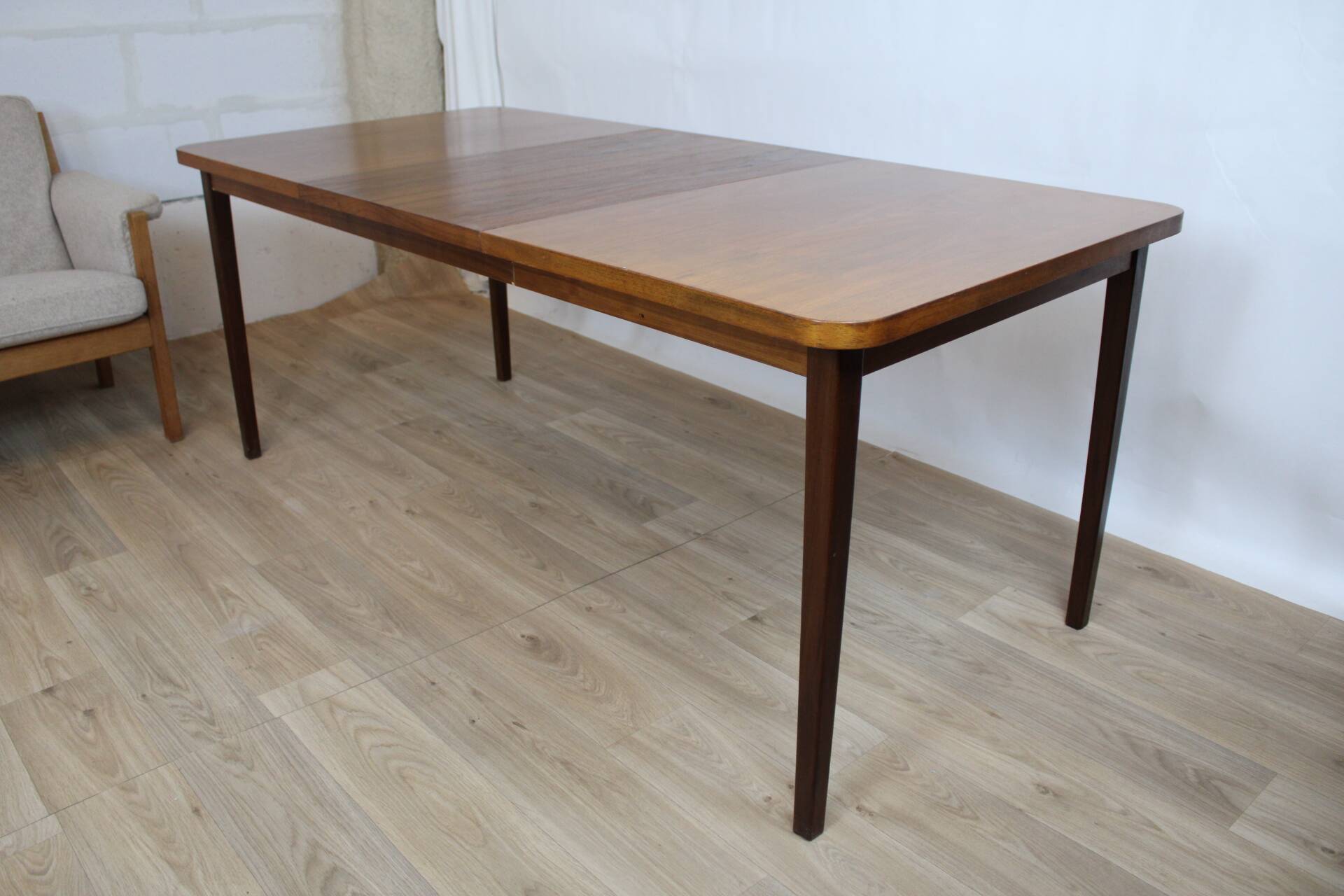 Vintage rectangular teak table with 130 cm dark legs and extension 1960 Sweden