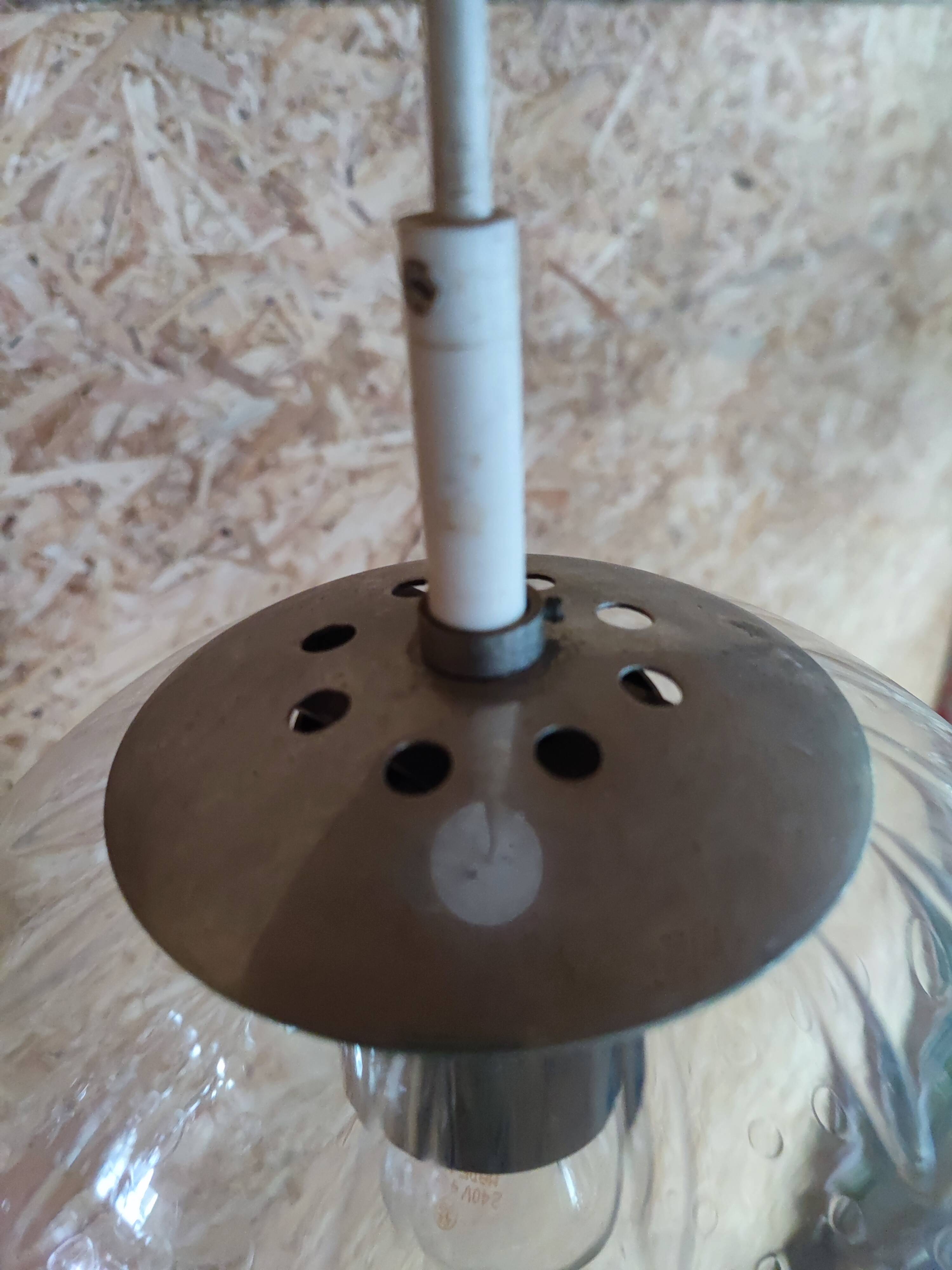 Bubbled glass globe pendant light. RAAK Amsterdam