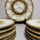 Service à huitres / coquillages vintage de 10 assiettes + 1 plat en faience de longchamp france
