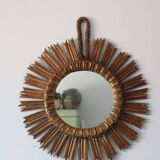 Old large sun mirror in gilded wood