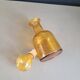 Amber molded glass carafe with stopper