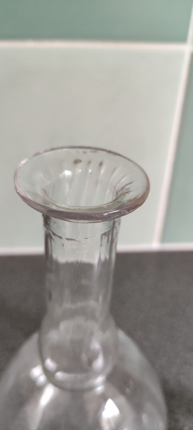 Antique decanter with its original cap