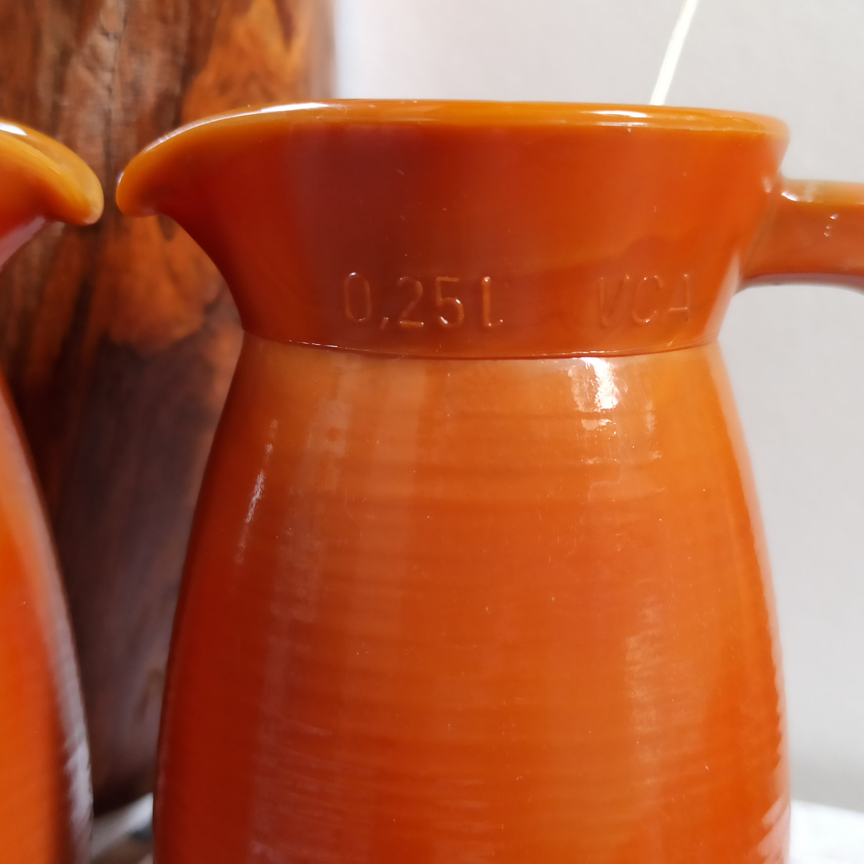 Two vintage arcopal volcano pitchers