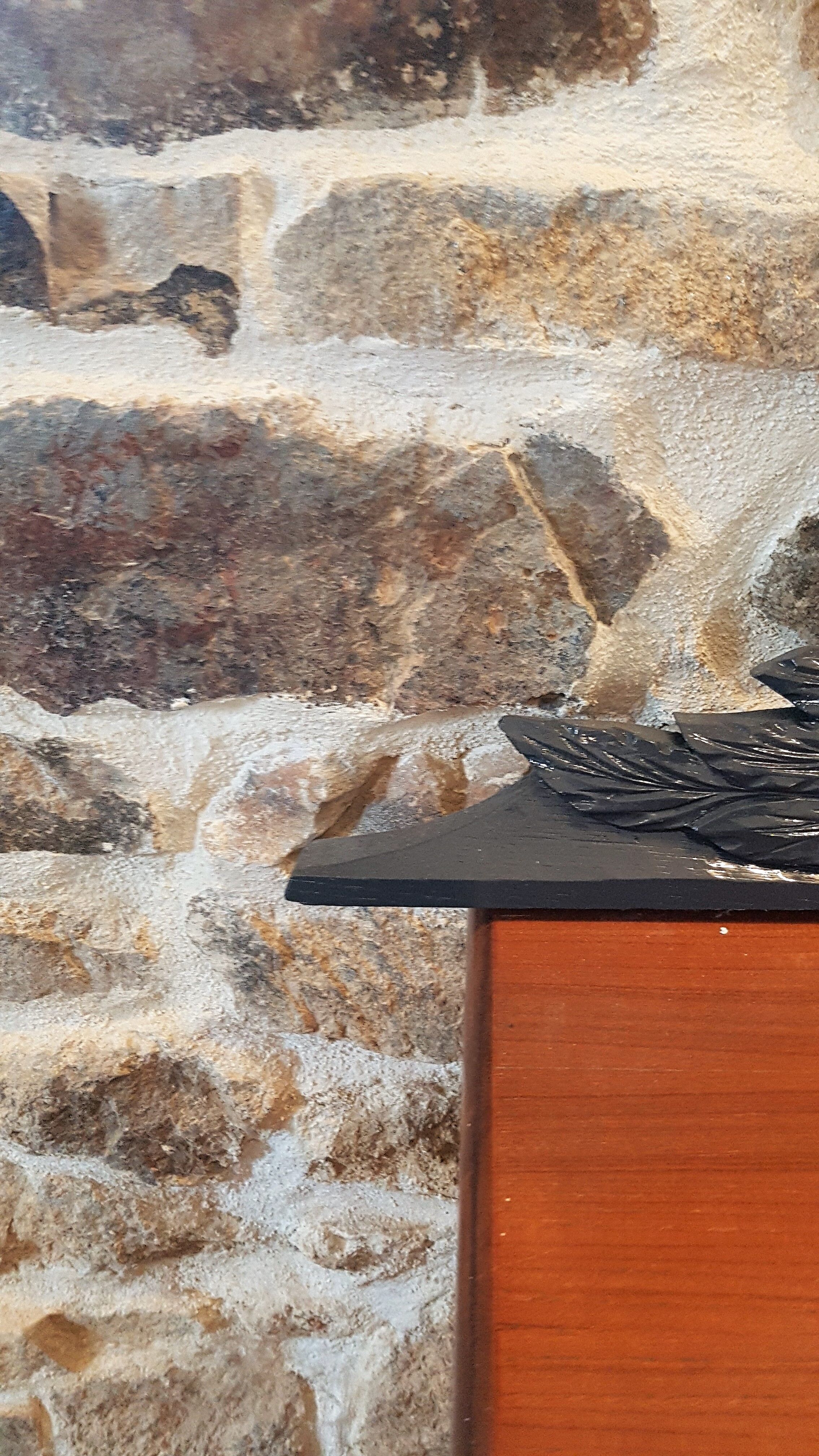 Old carved wooden pediment