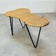 Raoul Guys coffee table, free form, wicker and metal, 1960s.