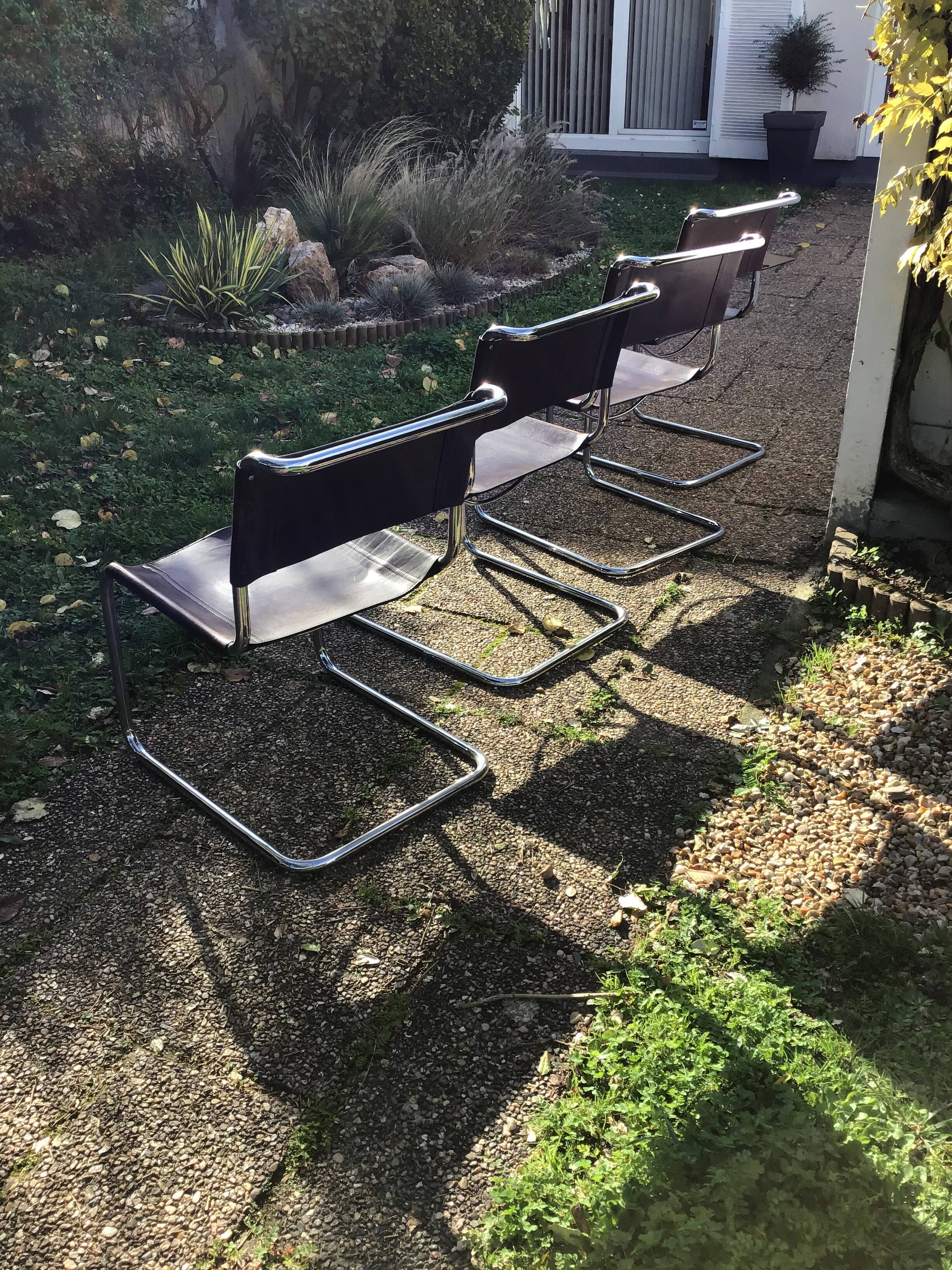 Suite of four S33 chairs