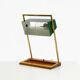 1960s Temde table lamp with a brass frame, teak base, and green lampshade
