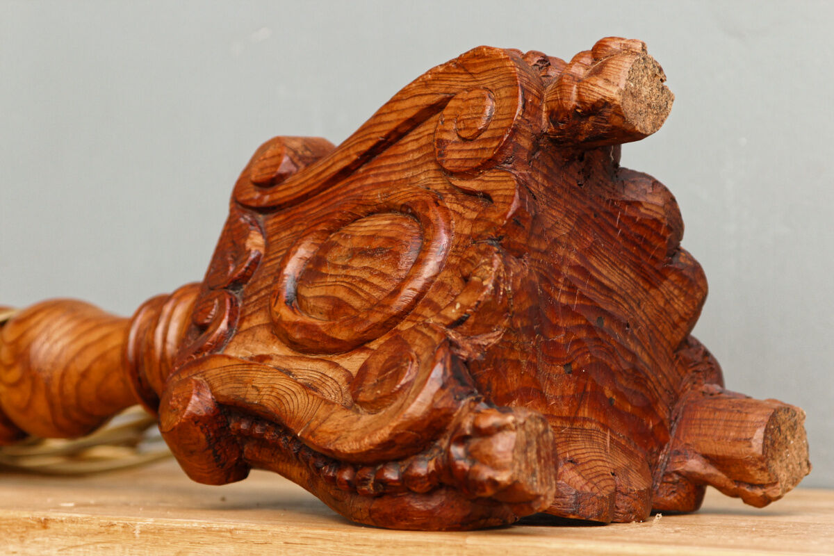 Carved wooden lamp, fiber shade