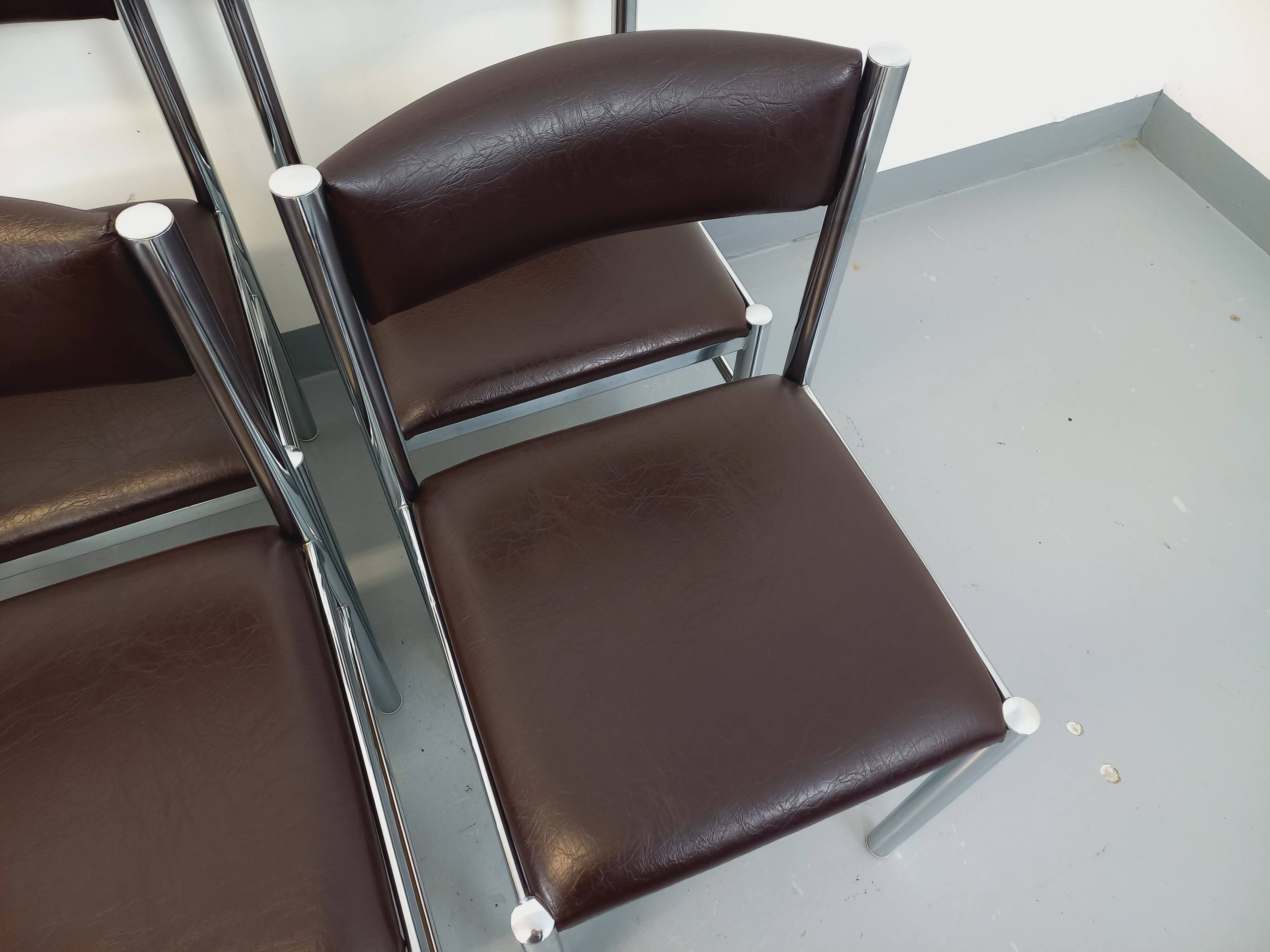 Set of 6 vintage chairs from the 70s in chrome metal and brown faux leather.