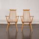 Set of 2 Windsor chairs with armrests.