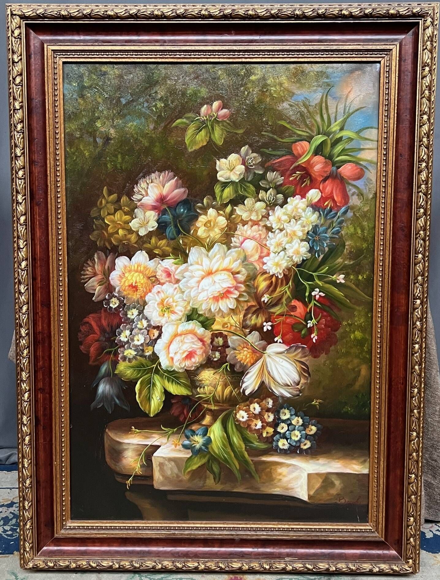 Nature morte signée avec des fleurs.