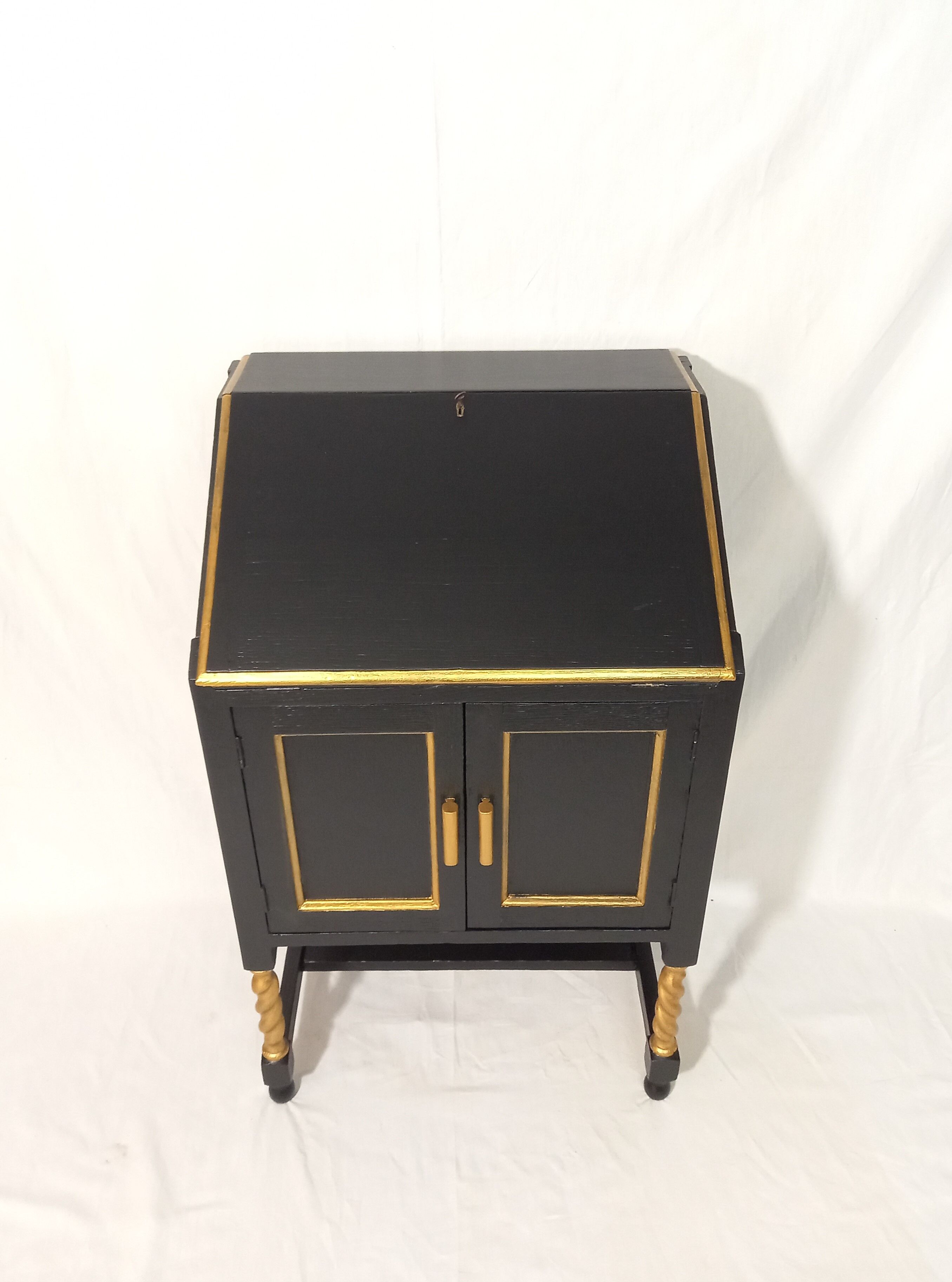 Small secretary with black and gold lid