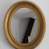 Mirror antique medallion gilded with gold leaf