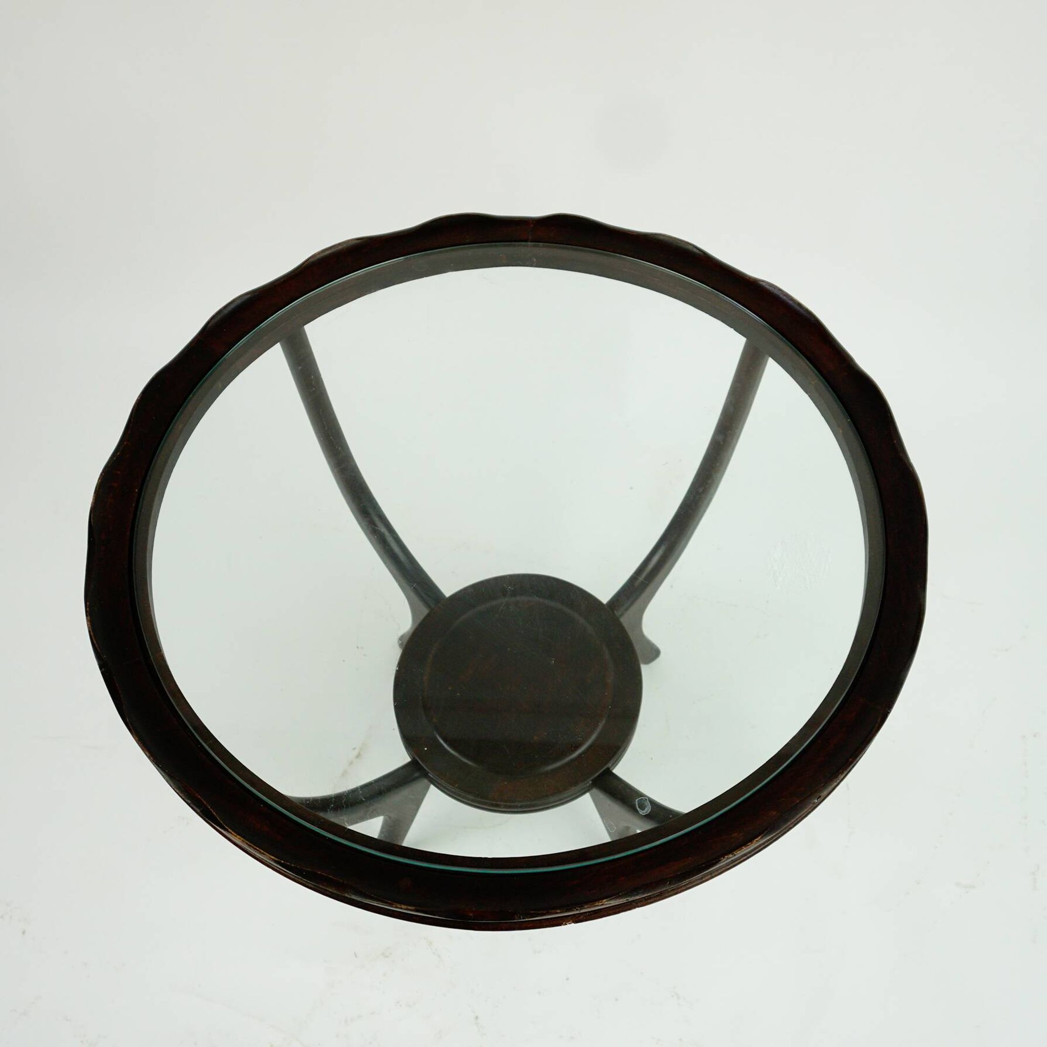 Italian round coffee table from the 1950s with a glass top, attributed to Carlo di Carli.