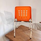 Chair with openwork plastic shell 1970