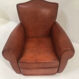 Large club chair in cognac leather