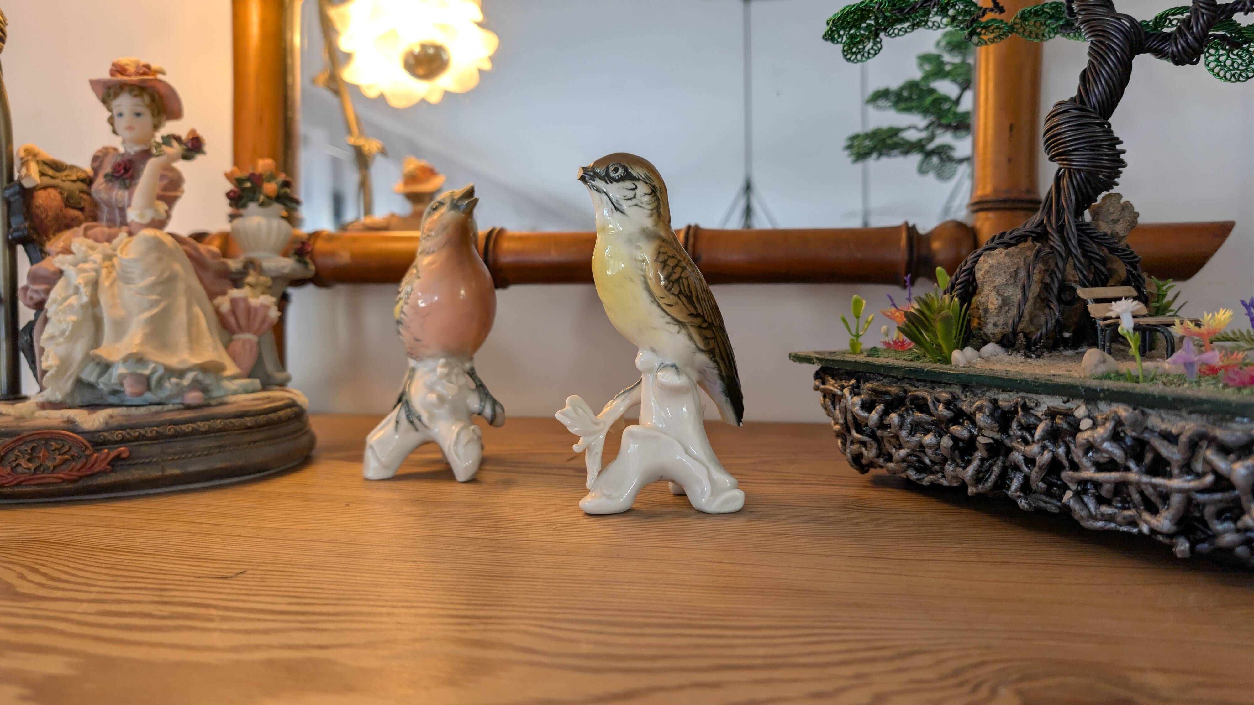 Pair of Karl Ens polychrome porcelain birds from Saxony
