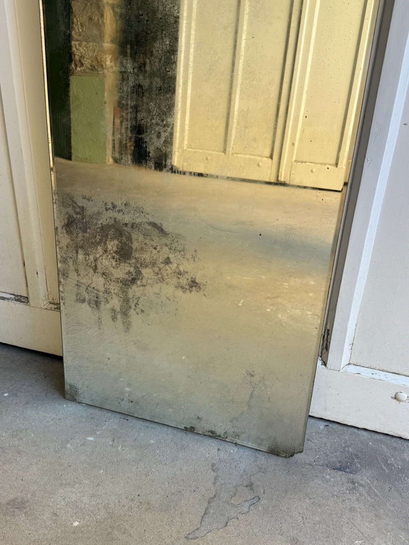 Large vintage mirror with bevelled glass.