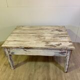 White patinated wooden coffee table