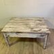 White patinated wooden coffee table