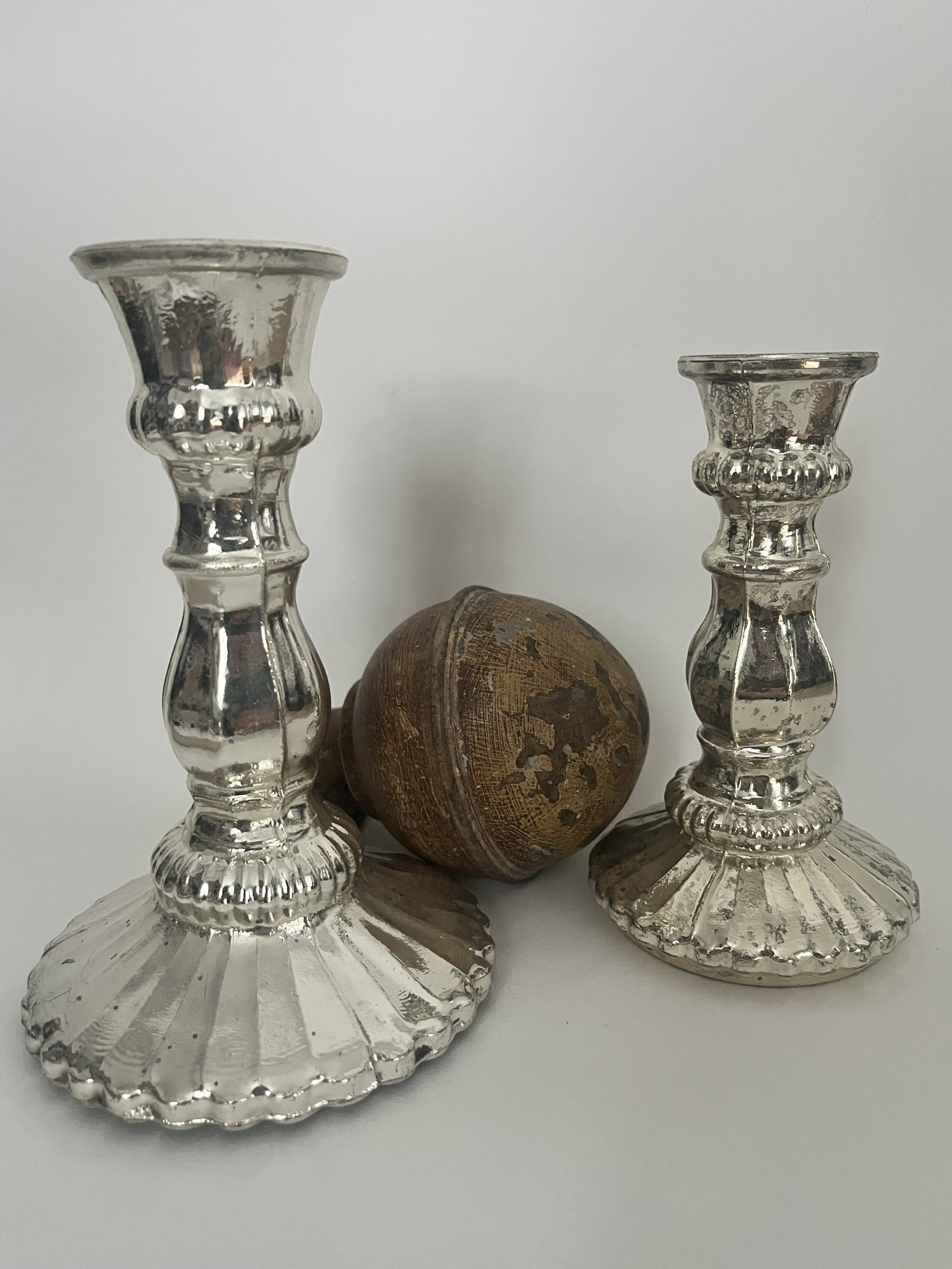 Pair of eglomisé glass candle holders, party decoration