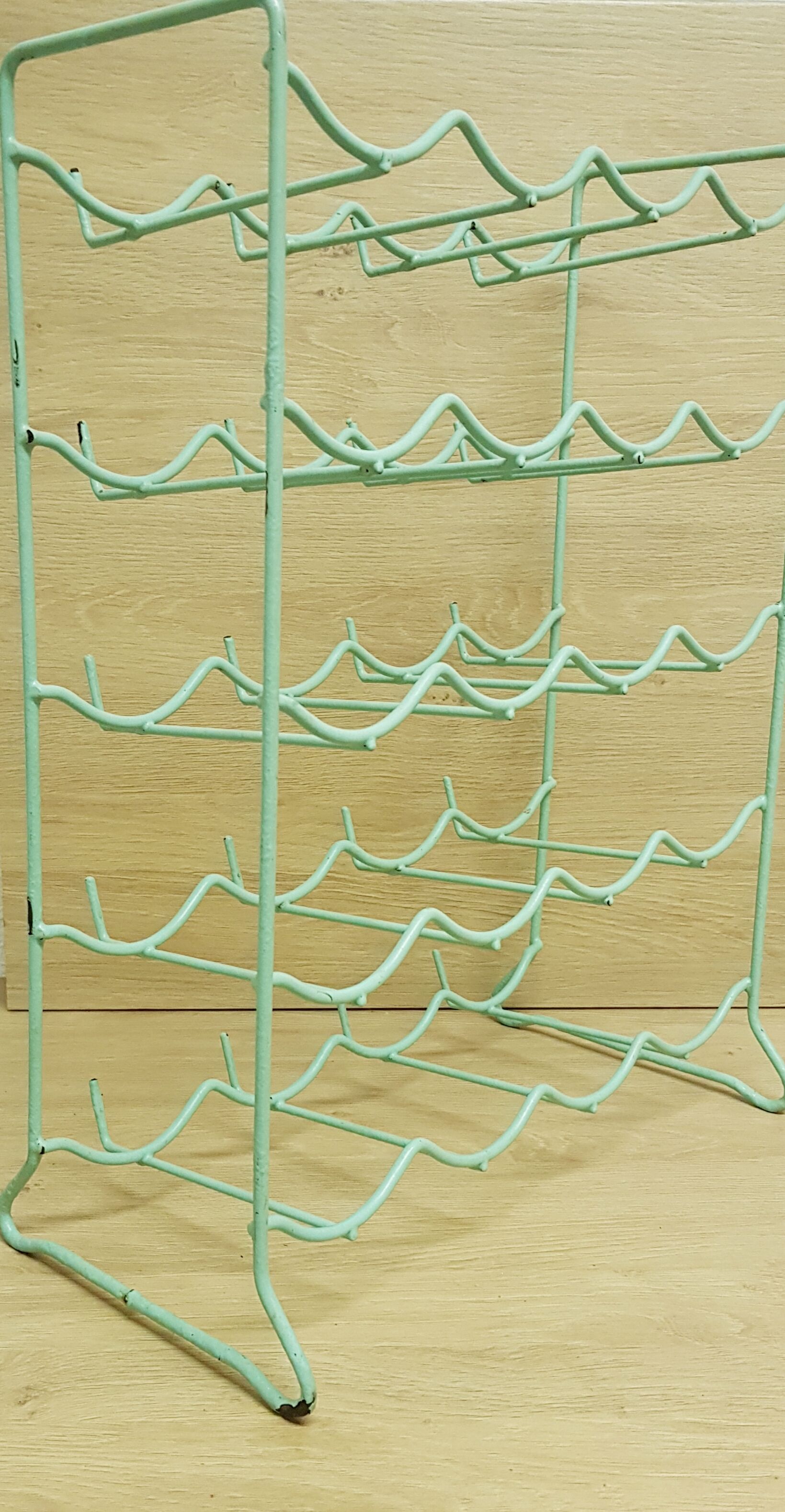 Metal aqua green bottle rack