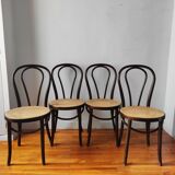 4 antique curved wood and cane chairs
