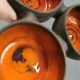Beautiful bowl (composed of 3 bowls) with orange/red glaze inside
