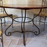 Table and four chairs wrought iron and wood