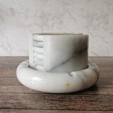 Ashtray and marble under glass