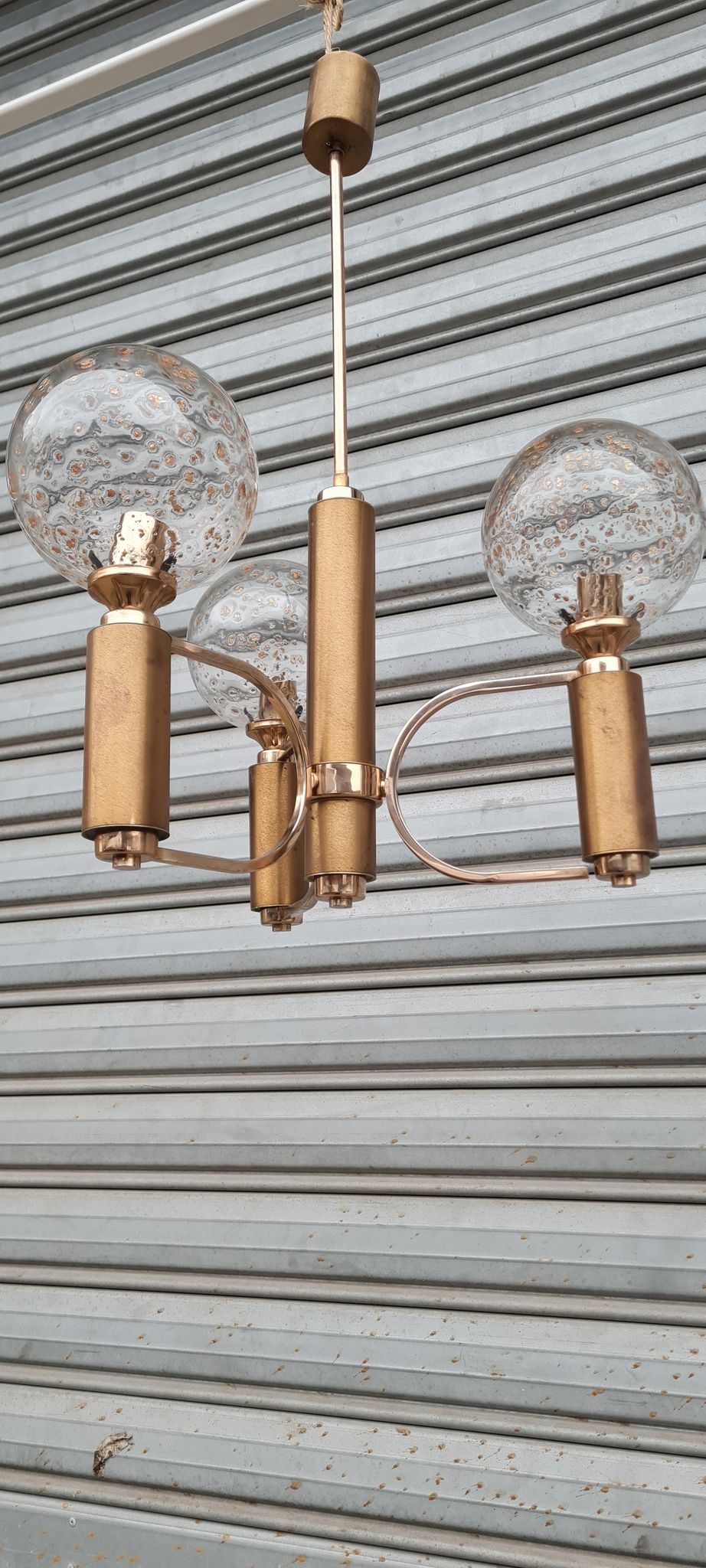 Brass and blown glass chandelier inlaid with gold