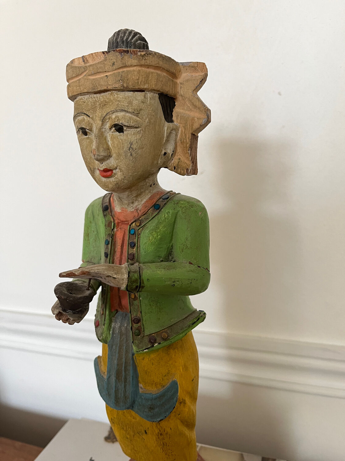 Traditional painted wooden figurine