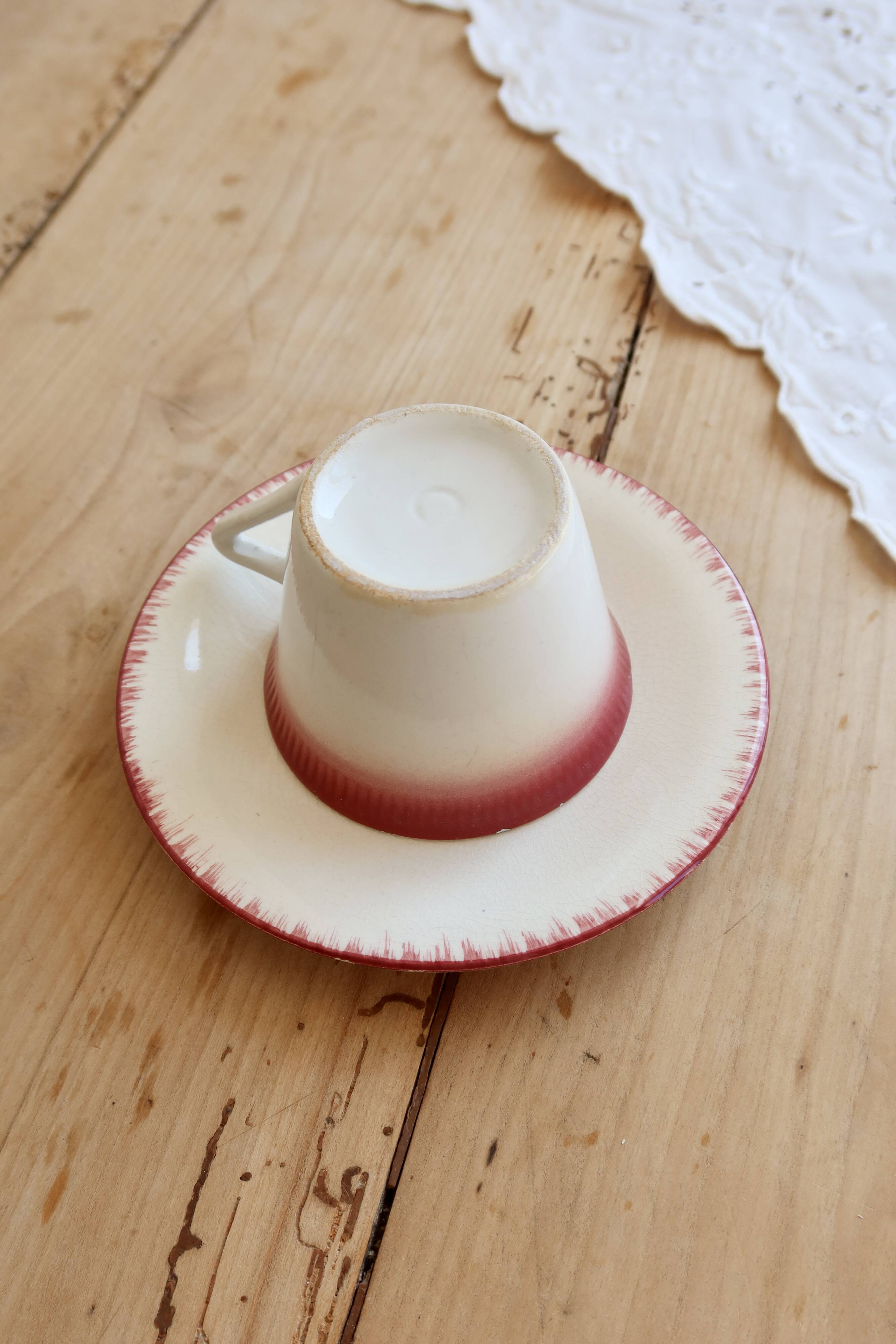 Antique Longchamp ironstone coffee cup with saucer.