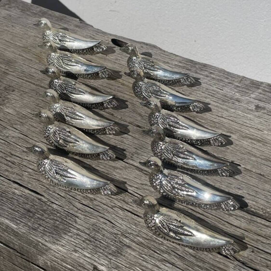 12 silver-plated metal knife rests with duck design