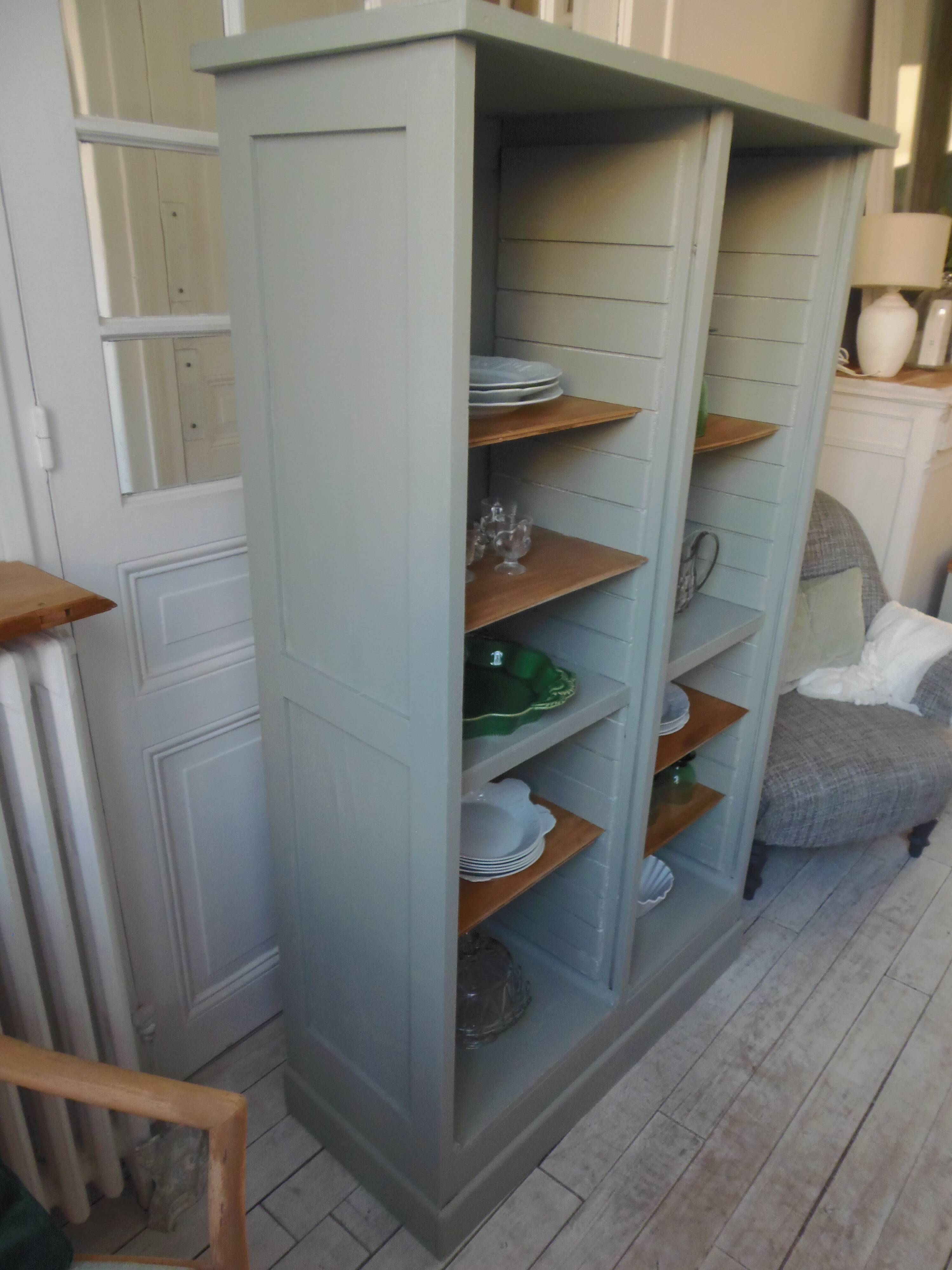 Vintage furniture transformed into a bookcase, verdigris patinated sideboard.