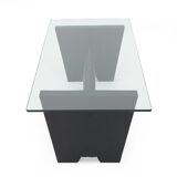 Coffee table with a glass top and black stained wood frame, 1930s.