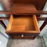 Antique wooden coat rack with mirror and shelf.